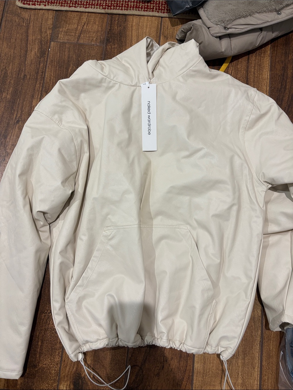 naked wardrobe faux leather cream pullover jacket with kangaroo pocket